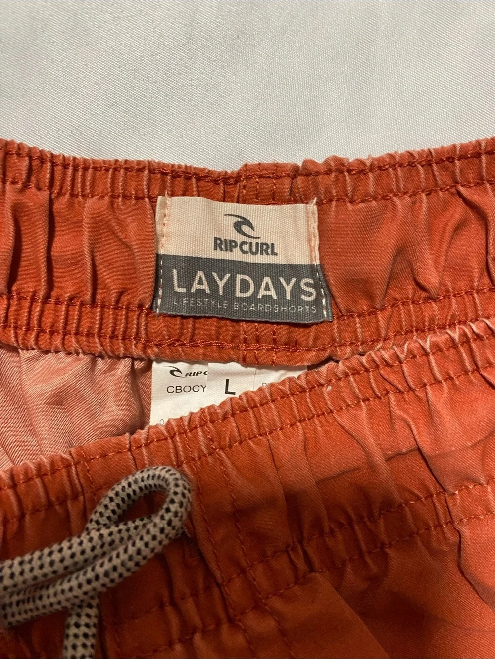 Rip Curl Men’s Rust Orange Swim Trunks